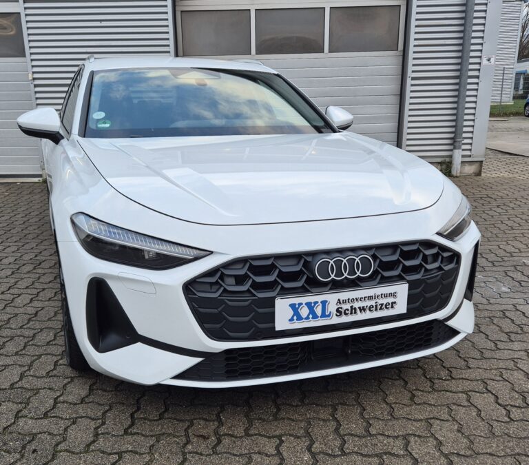 Audi A6 in Weiß, Frontansicht schräg links, mit XXL Autovermietung Schild